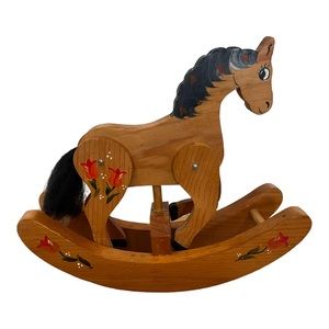 Wooden rocking horse with hand painted rosemaling design